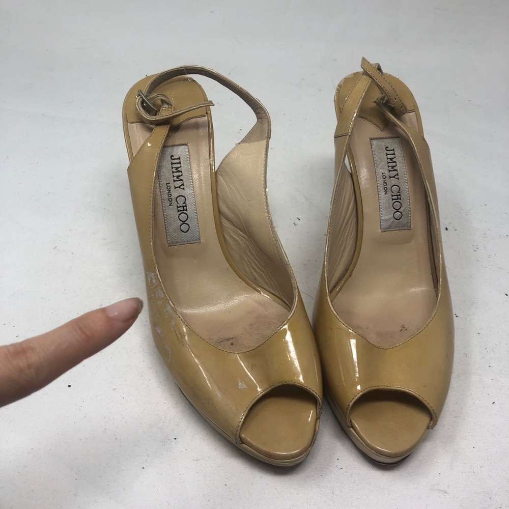Jimmy choo has paint stain see photo sz 37.5